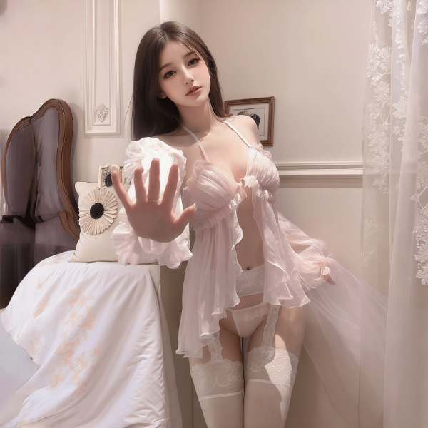 Woman wearing a seductive sheer princess sleep dress with transparent lace, backless design, and chest and hip reveal details...