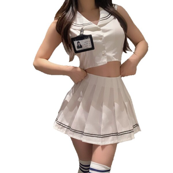Woman wearing a seductive student-style lingerie set with a cropped top and pleated skirt, featuring a playful uniform-inspir...