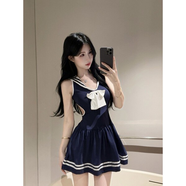 Navy schoolgirl dress with white bow, sheer waist cinching design, cute and sexy outfit for self-portrait.