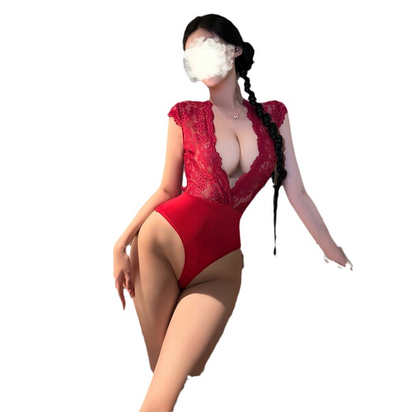 Woman wearing red lace bodysuit with deep v-neck and open-crotch design, featuring mesh detailing and elegant braided hair.