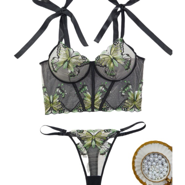 Sheer black lingerie set with green butterfly embroidery, featuring a lace bra and matching thong for women.