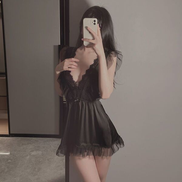 Woman in black lace nightgown with floral details, taking mirror selfie. sensual sleepwear set for women – youthful, pure, an...