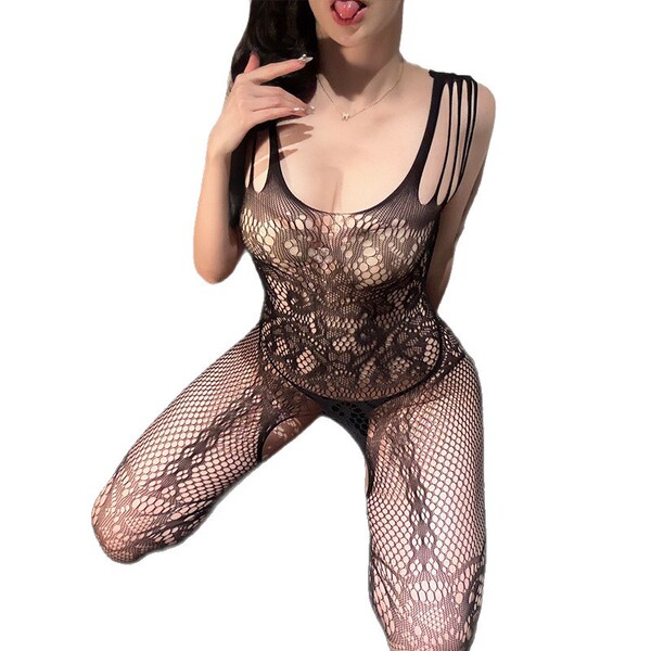 Woman wearing black mesh bodysuit with floral lace detailing, part of sensual lingerie sleep set – romantic erotic sleepwear.