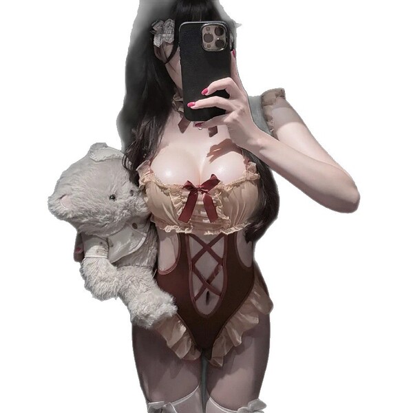 Woman in cute lace bodysuit with sheer mesh, holding teddy bear, taking mirror selfie. sweet sleepwear set for small bust.