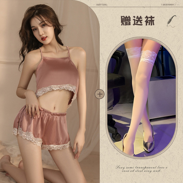 Sexy girl wearing a sensual no-remove bedtime lingerie set, featuring sheer sleepwear with nursing access and light lift desi...