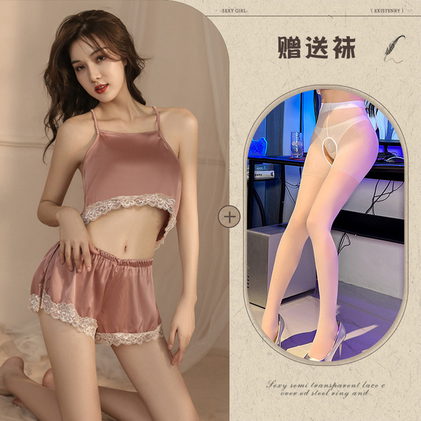 Sexy girl wearing sheer sleepwear with lace trim, featuring a halter top and shorts combo, perfect for intimate moments.