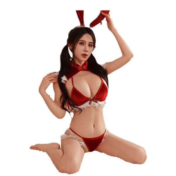 Woman in red bunny girl lingerie set with lace trim, bow tie, and ears. tempting christmas sleepwear for small bust.