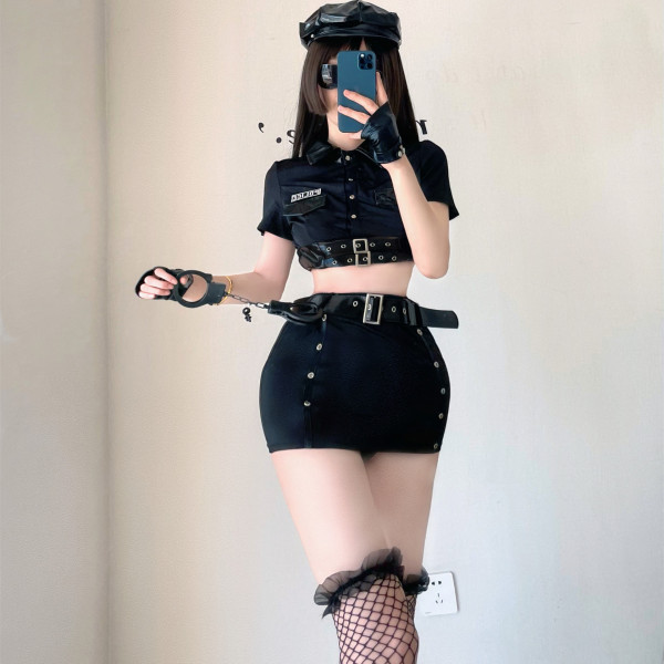 Woman wearing sexy police-style lingerie set with cap, gloves, and gartered stockings for cosplay or role play.