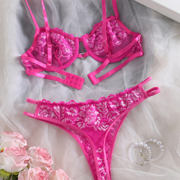 Sexy lace bra set for women in vibrant pink, featuring intricate floral patterns and matching panties, perfect for a romantic...