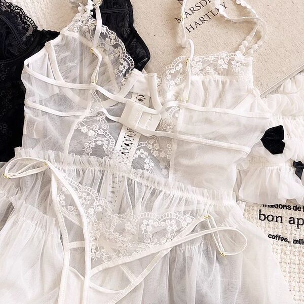 White sheer lace cami nightgown with floral trim and delicate straps, styled as an alluring lingerie set for women.