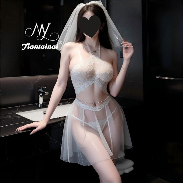 Woman in white lace bridal lingerie set with sheer skirt, pearl belt, and veil—sexy sleep dress for intimate moments.