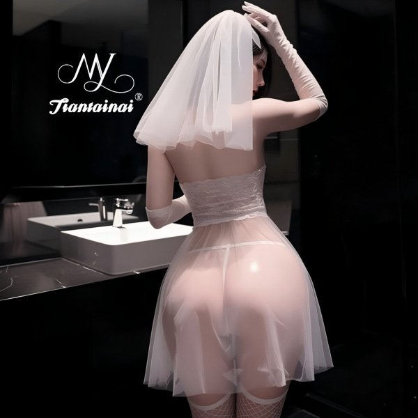 Woman in sheer lace bridal lingerie set with veil and gloves, showcasing elegant back design of the sexy sleep dress.