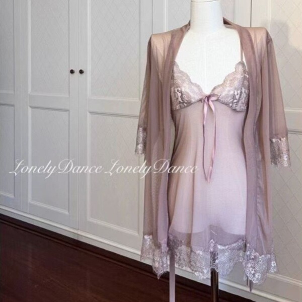 Sheer mesh cami and shorts set with delicate lace trim, perfect for seductive summer lounging.