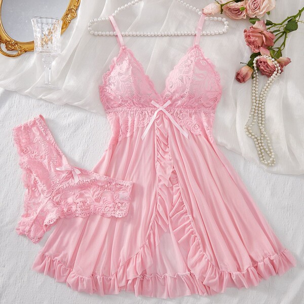 Elegant pink lace sleepwear set featuring high-slit design, delicate ruffles, and matching panties, perfect for feminine eleg...