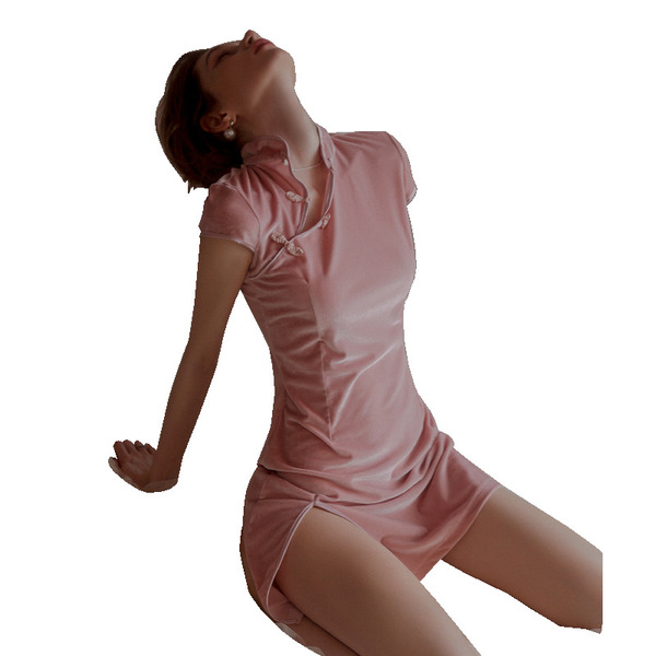 A woman poses elegantly in a pink cheongsam sleep dress featuring lace trim, high slit, and cut-out details, exuding sophisti...
