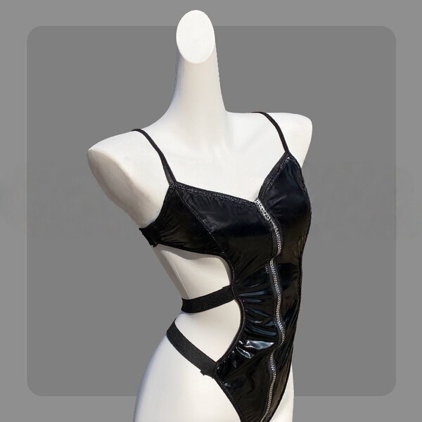 Sexy black latex-style backless bodysuit with push-up cups and front zipper detail on mannequin.
