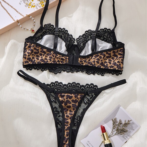 Sexy leopard print lace bra set with black trim, lightweight push-up design for women, wild and alluring lingerie.