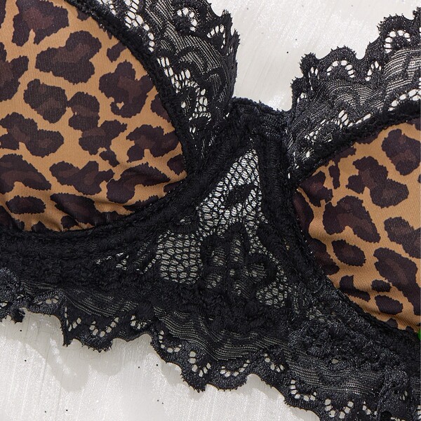 Sexy leopard print lace bra set with black floral trim, lightweight push-up lingerie for women, wild and alluring design.