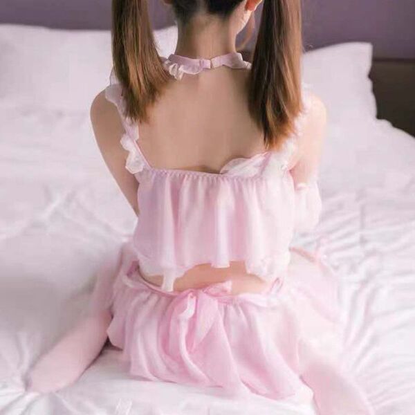 Sexy maid costume for women featuring cute and alluring pink sleepwear set with ruffled details, perfect for seductive bedroo...
