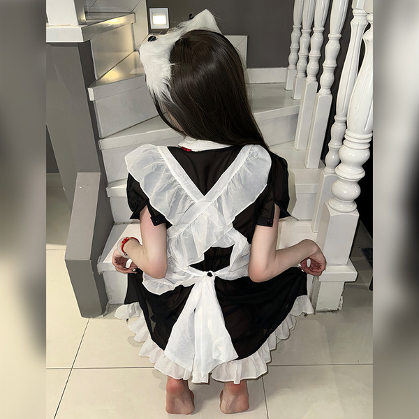 Sexy maid costume for women featuring sheer lace, ties, and apron set, perfect for seductive role play outfits.
