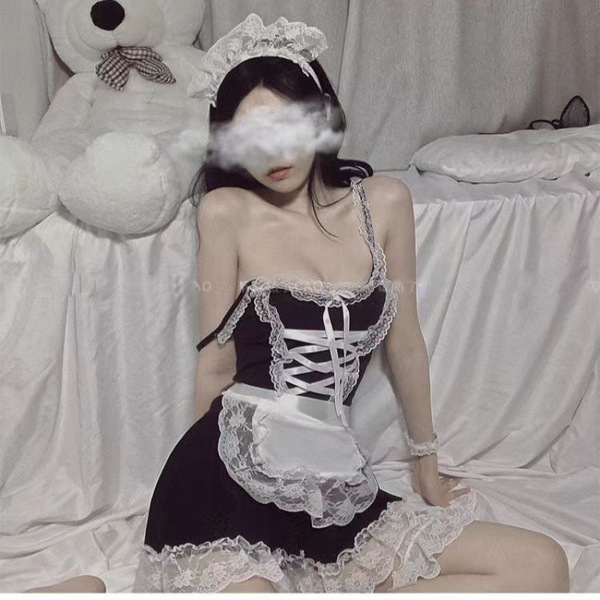 Sexy maid costume for women featuring a black lace dress with corset design, perfect for role play and at-home fun.