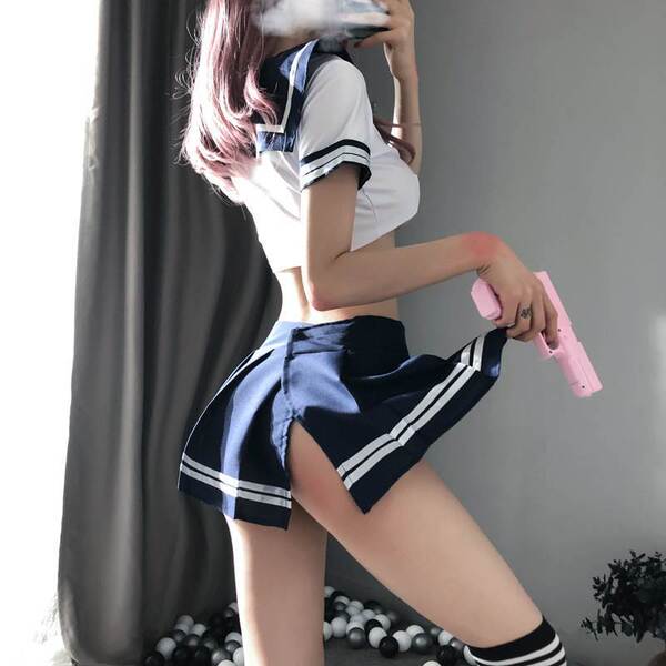 Sexy maid costume for women featuring a short navy skirt sailor jk student outfit with white accents, paired with black and w...