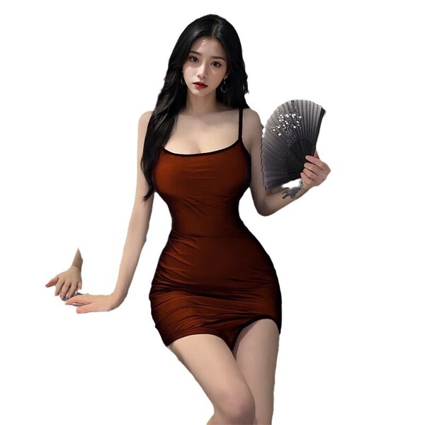 Woman in a tight brown bodysuit dress holding a fan, showcasing the sexy mesh lace bodysuit dress for a flirty nightclub look...