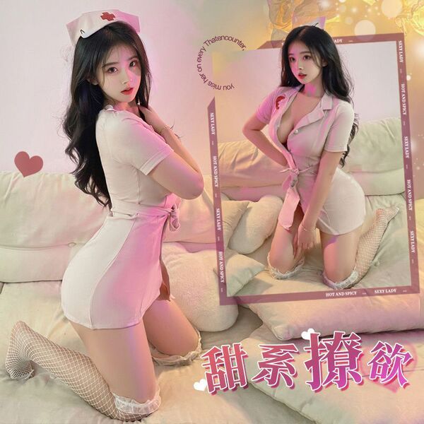 Woman modeling pink and white sexy nurse costume with short skirt, top, cap, and fishnet stockings for role play.