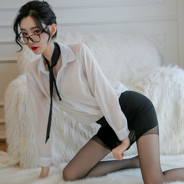 Woman in sexy secretary costume set with sheer blouse, black pencil skirt, and stockings for role play or cosplay.