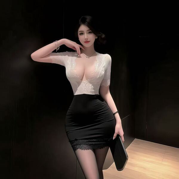 Woman wearing sexy secretary pencil skirt set with lace top and black skirt, posing elegantly in office chic outfit.