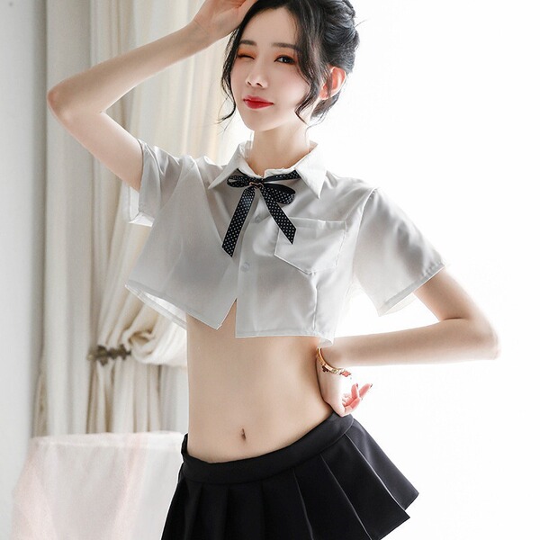 Woman modeling white sheer jk uniform shirt with black bow and pleated skirt, college style no-remove design.