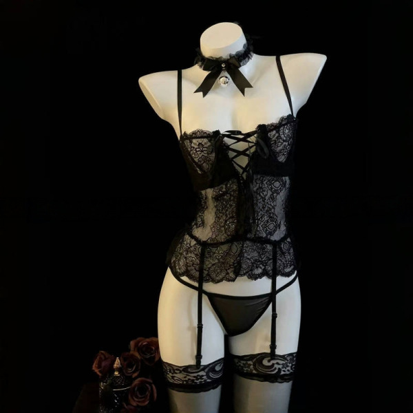 Black lace push-up lingerie set with garters and choker, designed for small busts, displayed on a mannequin.