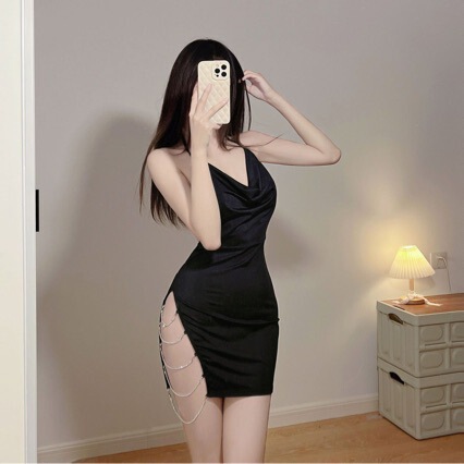 Woman wearing black deep v plunge sheath dress with sparkling side slit, elegant secretary costume outfit for night.