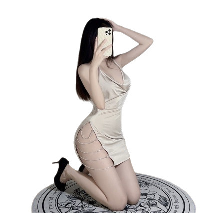 Woman in sexy strap sleepwear set with deep v plunge sheath dress, sparkling side slit, and secretary costume outfit.