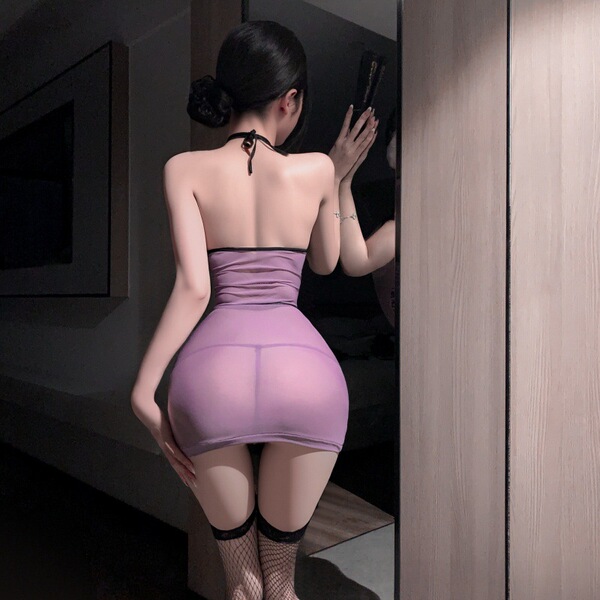 Woman in purple sheer lace cheongsam lingerie set, back view showing seductive nightgown outfit with fishnet stockings.