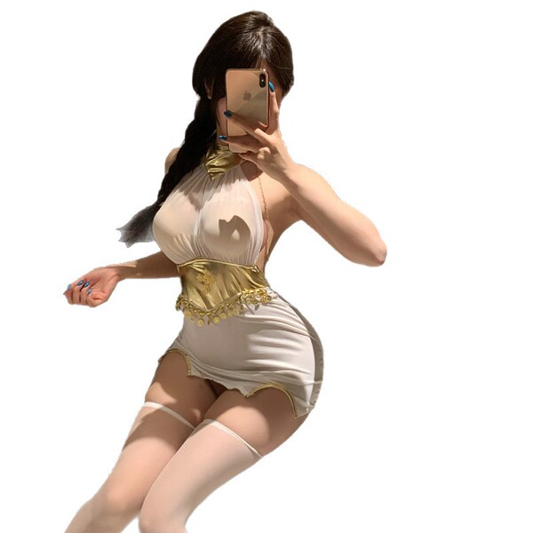 Woman in sexy western-style lace bodysuit and bodycon mini skirt set, featuring sheer mesh details and gold accents.
