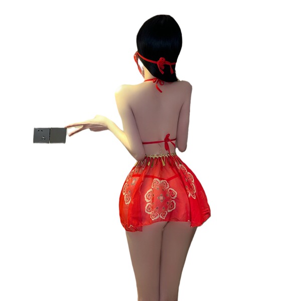 A woman wears a red shimeisha chinese new year lingerie set, featuring an exotic dance-inspired design with intricate pattern...