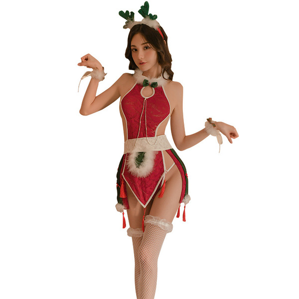 A woman models a festive costume featuring a red and green chinese-style hanfu design with reindeer antlers, perfect for chri...