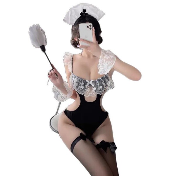 A woman poses in a black maid costume set featuring lace details, holding a feather duster while taking a selfie. includes sl...
