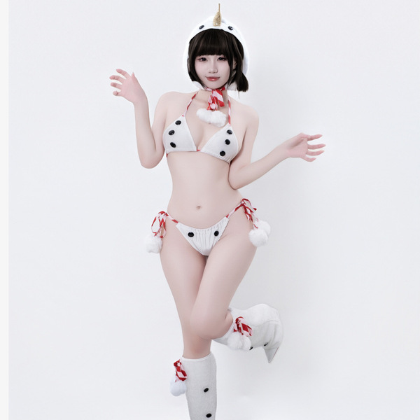 A woman models a white fuzzy christmas costume featuring a snowman-themed bikini set with black polka dots, red accents, and ...