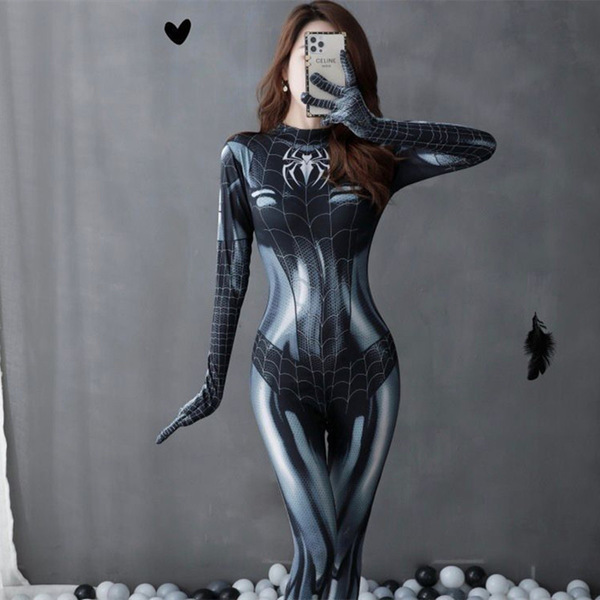 Woman in black spider-man bodysuit with web pattern, taking selfie; sexy tight-fit open-crotch design for adults.