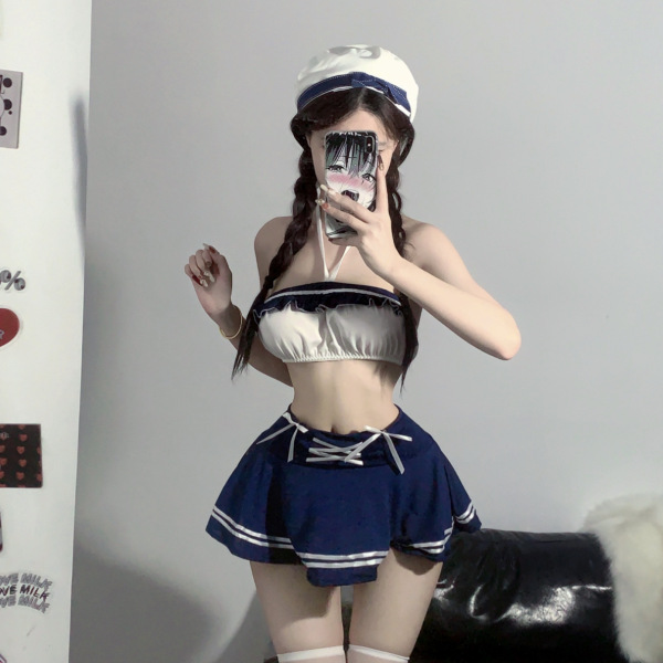 Woman in sailor-themed sultry lace lingerie set for small busts, sheer open-crotch design, student roleplay outfit with hat a...