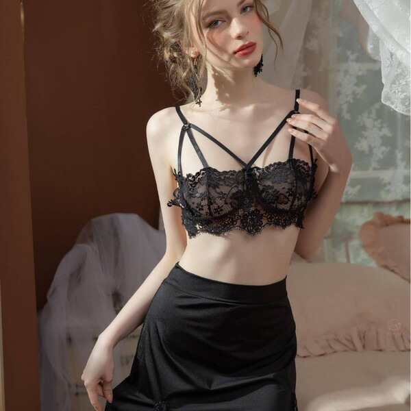 Sultry lace sheer sleepwear set featuring delicate floral designs, perfect for a night of elegance and comfort.