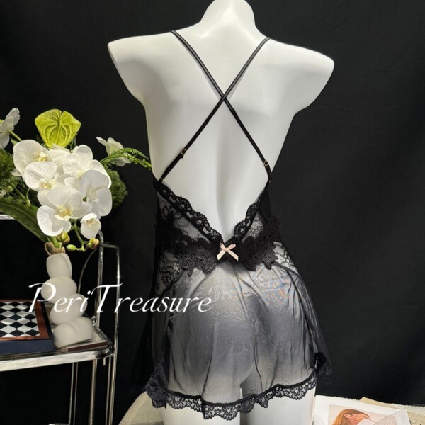 Black sheer lace bodysuit with crisscross straps and bow detail, featuring a low-cut bust and seductive cut-outs for summer.