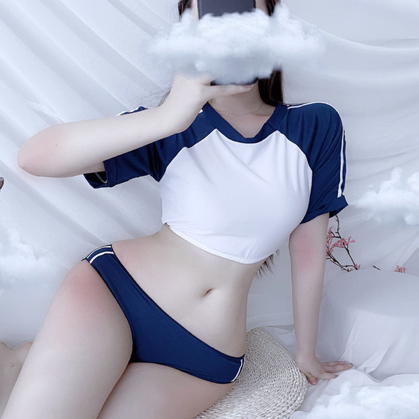 A woman poses with a cloud above her face, wearing a blue and white swimsuit resembling a japanese schoolgirl uniform. the ou...