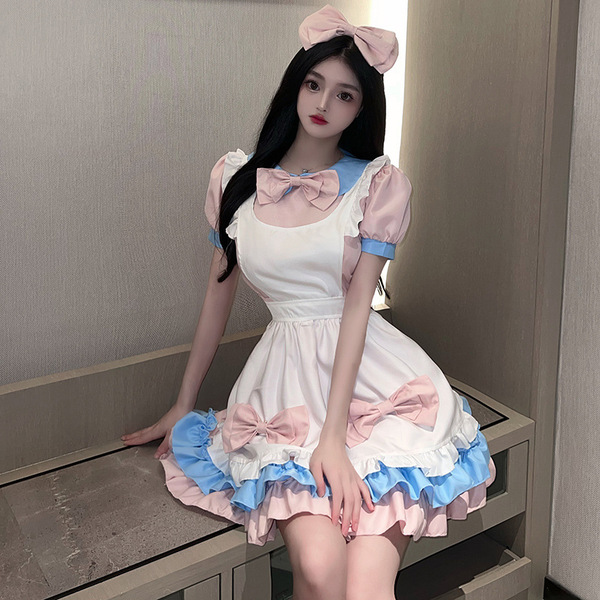 A woman wears a charming maid lolita dress with pastel pink and blue accents, featuring ruffles and bows, perfect for anime-t...