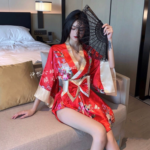 Woman in red floral suoqing japanese-style sexy lingerie kimono robe with low-cut design, holding a black lace fan.