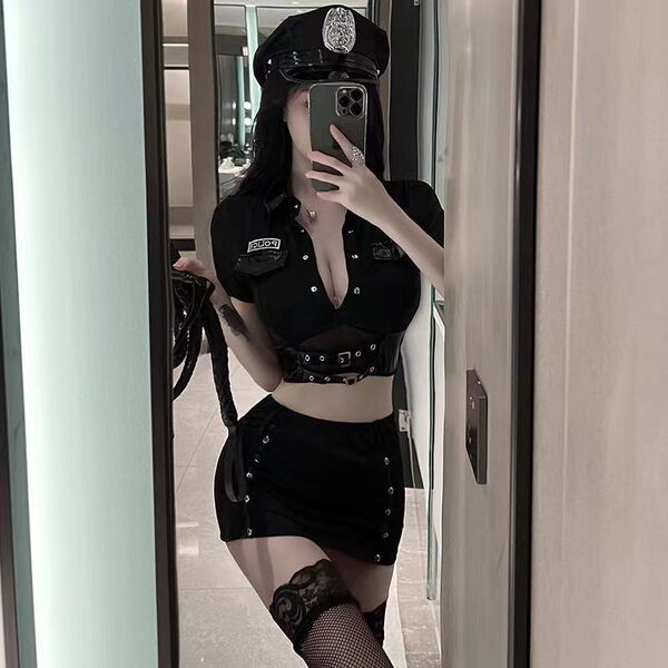 Woman in suoqing police uniform lingerie set with short skirt, crop top, and hat, posing for mirror selfie.