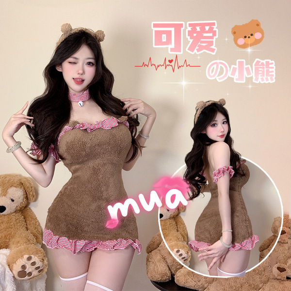 A woman wearing a cute, plush bodysuit with cat ears, perfect for sleepwear or loungewear. the set features a charming design...