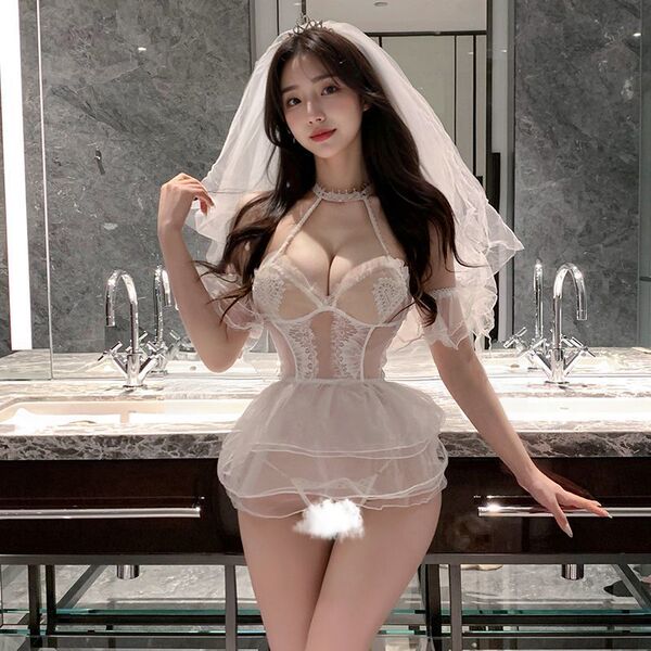 Woman in white lace temptation lingerie set with veil, posing in bathroom. sexy bridal cosplay outfit for romantic wedding ni...